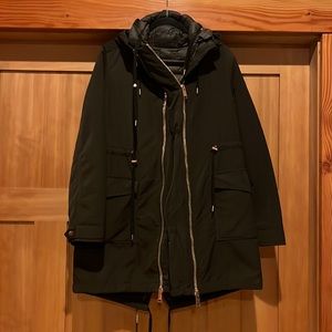 Dark olive green maternity jacket. Additional front panel.